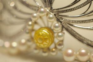 Close-up of the 15mm Dong Son engraved golden pearl at the center of the Miss Vietnam 2014 crown